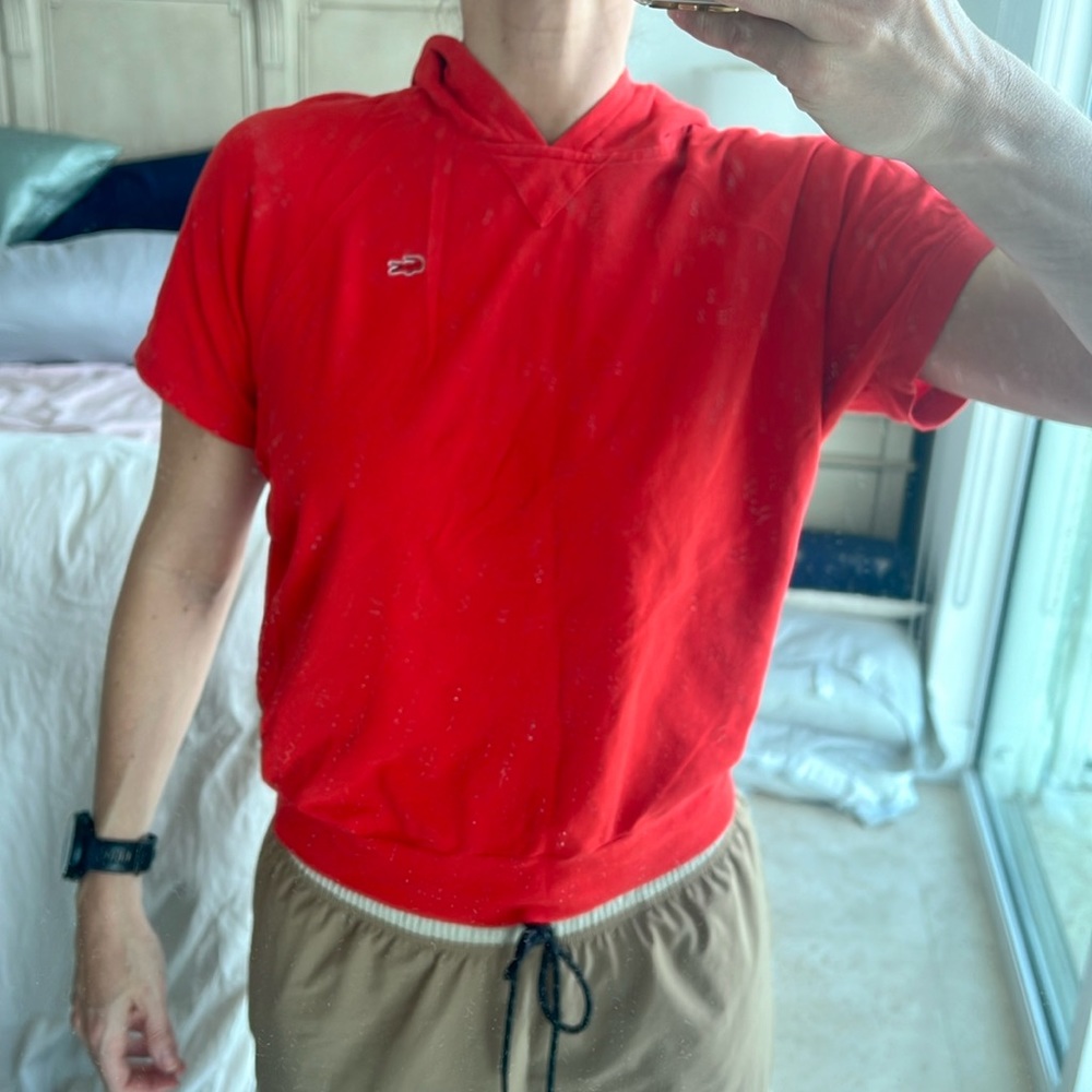 Lacoste size 38 (medium) hooded orange pique top